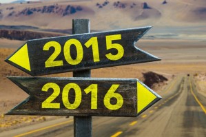 2015 - 2016 signpost in a desert road background